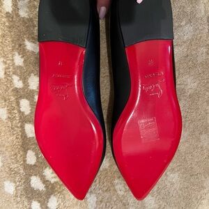 Christian Louboutin Black Flats with Iconic Red Soles